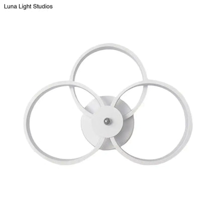 White three-ring wall sconce by Decorbites with interconnected circular frames on Tampa Home & Garden Store