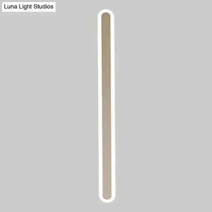 White acrylic wall sconce by Decorbites; tall slim vertical LED with rounded ends on Tampa Home & Garden Store
