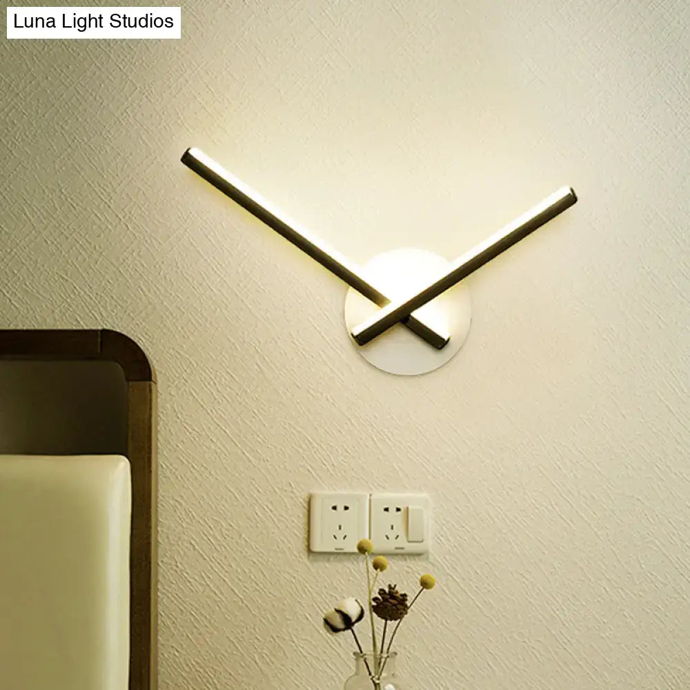 White Ceiling Light Direct Wired X-shaped LED wall light on round backplate Decorbites on Tampa Home & Garden Store
