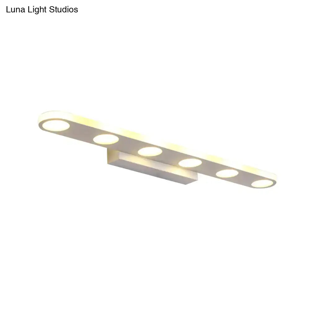 White acrylic 23-inch vanity light by Decorbites with four round LEDs on a wall-mount bar on Tampa Home & Garden Store