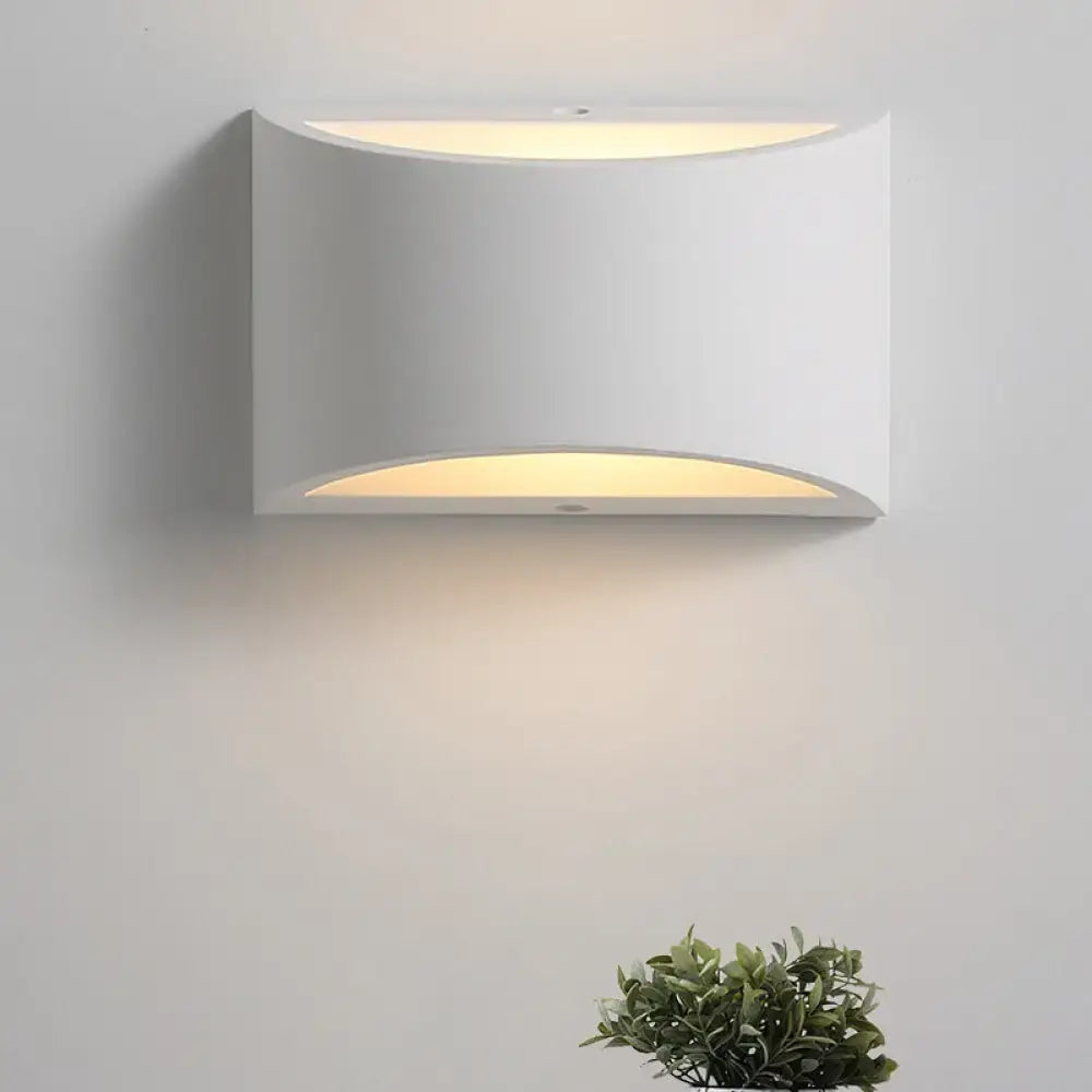 White gypsum oval textured wall sconce by Decorbites, ambient glow on Tampa Home & Garden Store