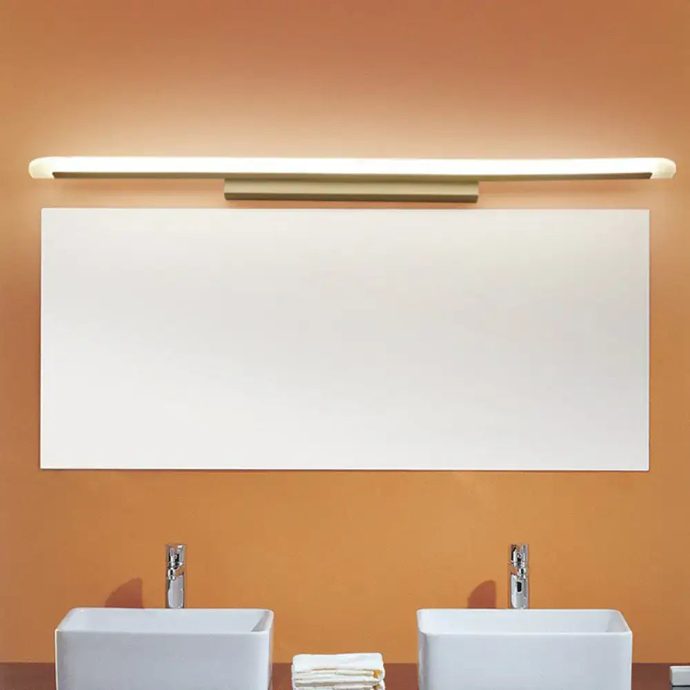 White LED Vanity Sconce by Decorbites with metallic base, wall-mounted above a mirror on Tampa Home & Garden Store
