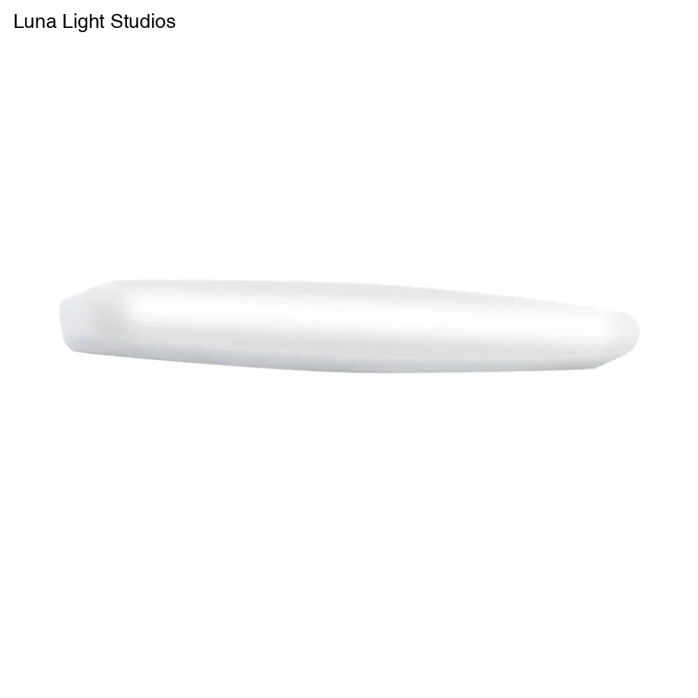 White modern LED wall light, slim curved bar design, wall-mounted fixture on Tampa Home & Garden Store