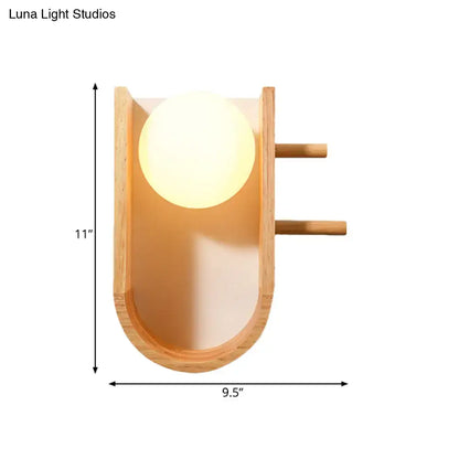 Wooden Modern Wall Sconce with curved back panel and warm frosted globe light on Tampa Home & Garden Store