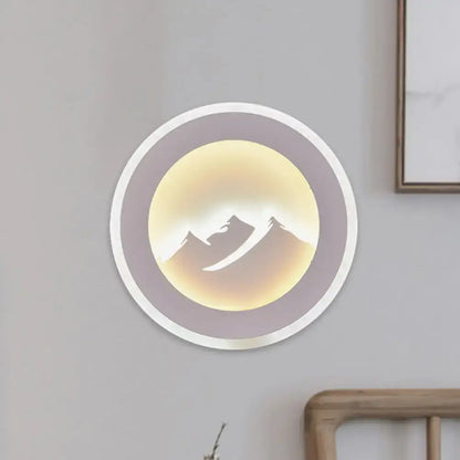Mountain Silhouette Wall Sconce by Decorbites, round wall light with warm mountain cutout on Tampa Home & Garden Store