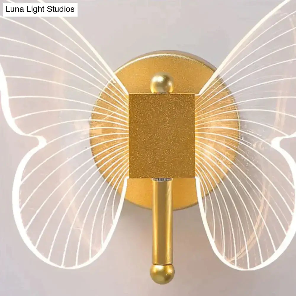 Gold Butterfly Wall Lamp by Decorbites with textured round backplate and winged translucent panels on Tampa Home & Garden Store