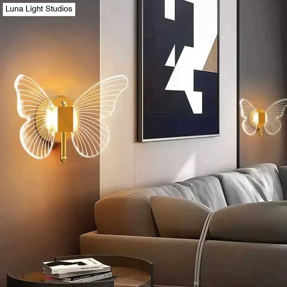 Gold Butterfly Wall Lamp pair with metal wireframe wings and warm glow by Decorbites on Tampa Home & Garden Store