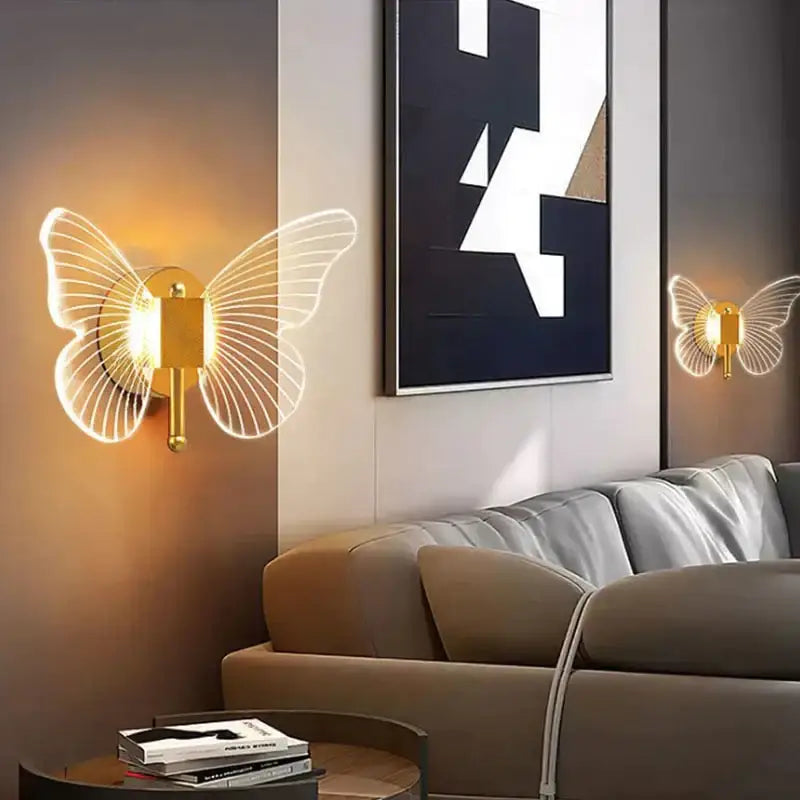 Gold Butterfly Wall Lamp pair by Decorbites with wireframe wings and warm glow on Tampa Home & Garden Store