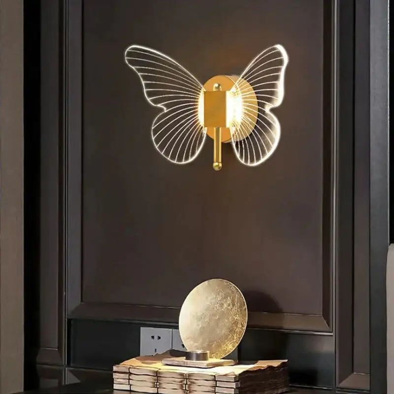 Gold Butterfly Wall Lamp by Decorbites, gold metal wall sconce with illuminated butterfly wings on Tampa Home & Garden Store