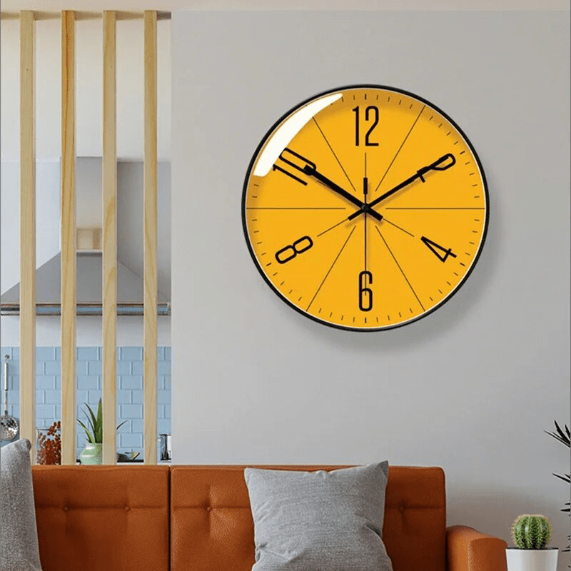 Modern Scandinavian Moktan Sabai wall clock in yellow with black numerals and simple hands on Tampa Home & Garden Store