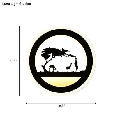 Black acrylic built-in shelf wall sconce with elephant silhouette under a tree by Decorbites on Tampa Home & Garden Store