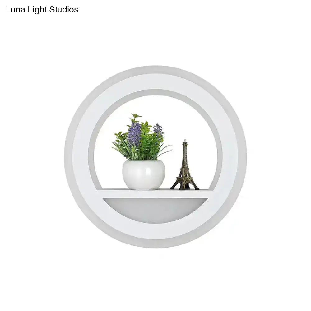 Black acrylic built-in shelf wall sconce with plant and Eiffel Tower decor on Tampa Home & Garden Store