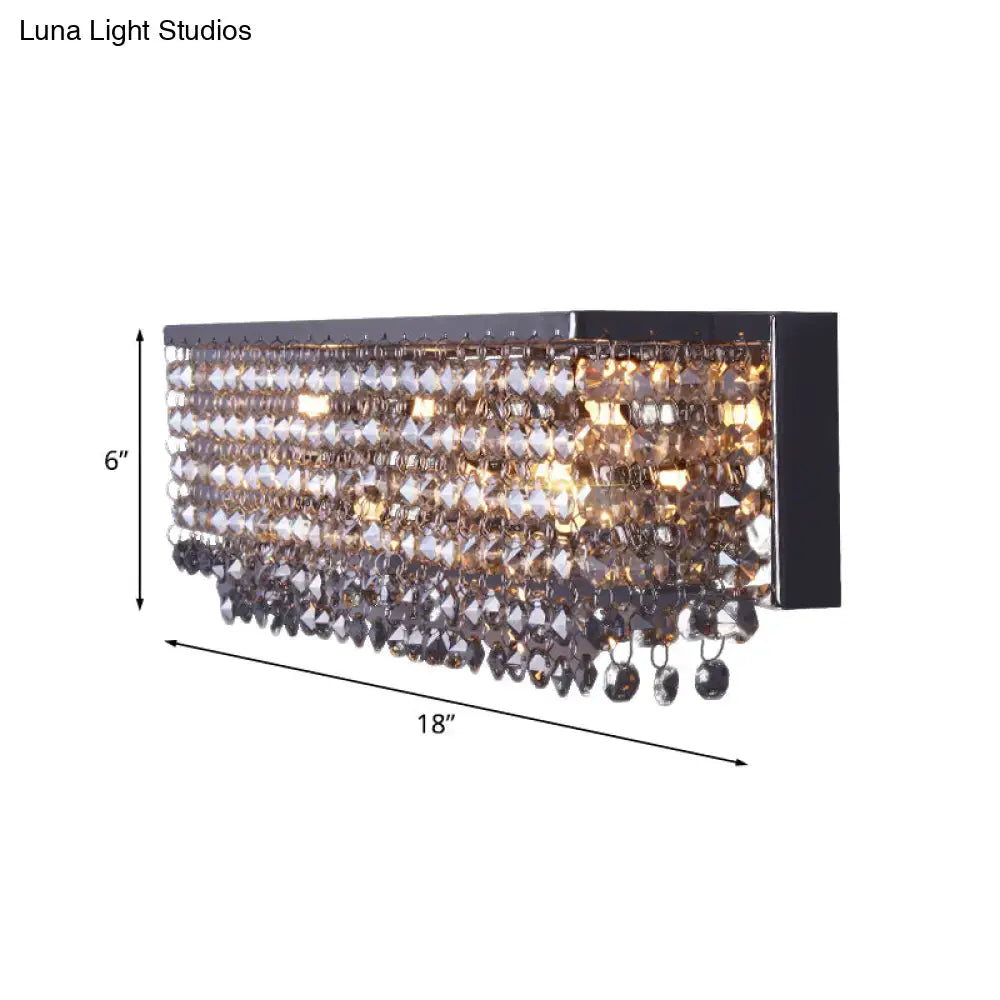 Chrome octagonal crystal wall light fixture with hanging prisms by Decorbites on Tampa Home & Garden Store