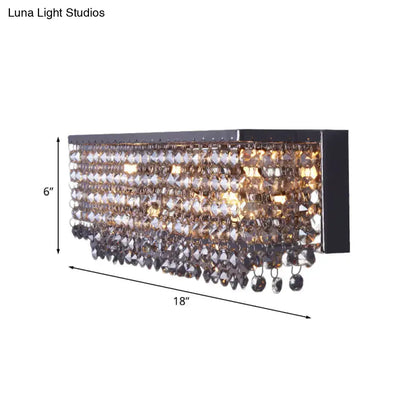 Chrome octagonal crystal wall light fixture with hanging prisms by Decorbites on Tampa Home & Garden Store