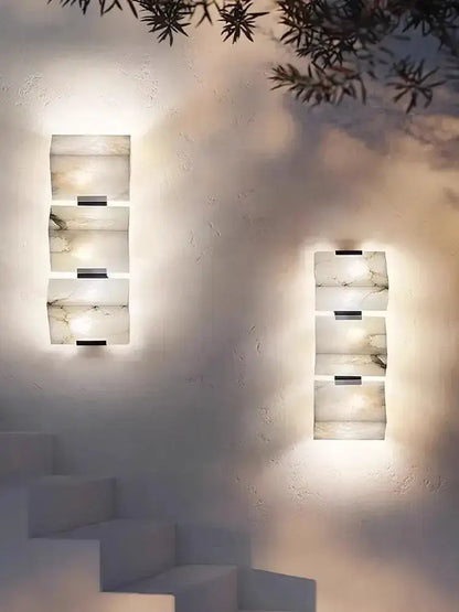 Modern onyx amber geometric LED outdoor wall sconce pair with marble blocks Decorbites on Tampa Home & Garden Store