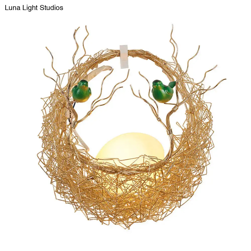 Opal Glass Bird Nest Sconce with gold wire nest and two green birds by Decorbites on Tampa Home & Garden Store