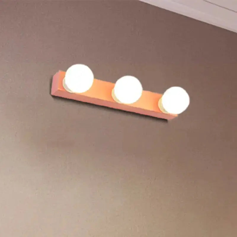 Modern orange and white 3-bulb vanity light fixture for bedroom by Decorbites on Tampa Home & Garden Store