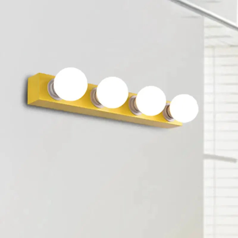 Modern orange and white 4-bulb vanity light fixture by Decorbites for bedroom on Tampa Home & Garden Store