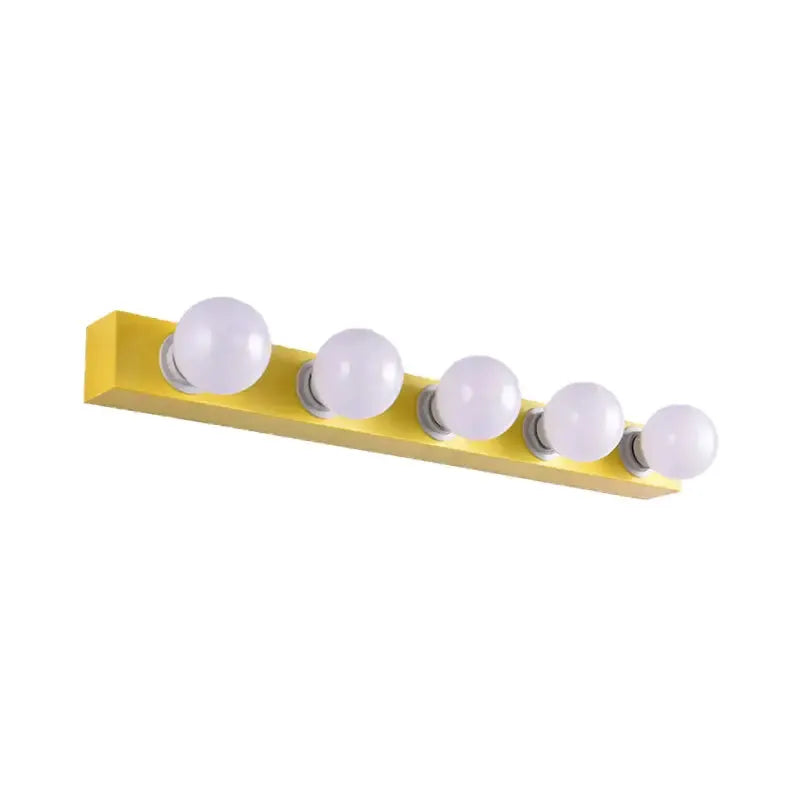 Modern orange and white vanity light fixture with six globe bulbs on a bar on Tampa Home & Garden Store