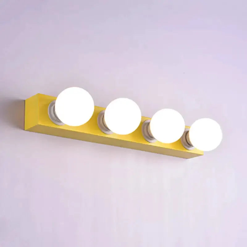 Modern orange and white 4-bulb vanity light with bulbs on yellow bar for bedroom on Tampa Home & Garden Store