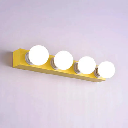 Modern orange and white 4-bulb vanity light with bulbs on yellow bar for bedroom on Tampa Home & Garden Store