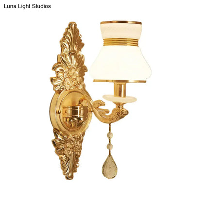 Decorbites Gold Frosted Wall Sconce with ornate floral backplate and white shade with crystal drop on Tampa Home & Garden Store