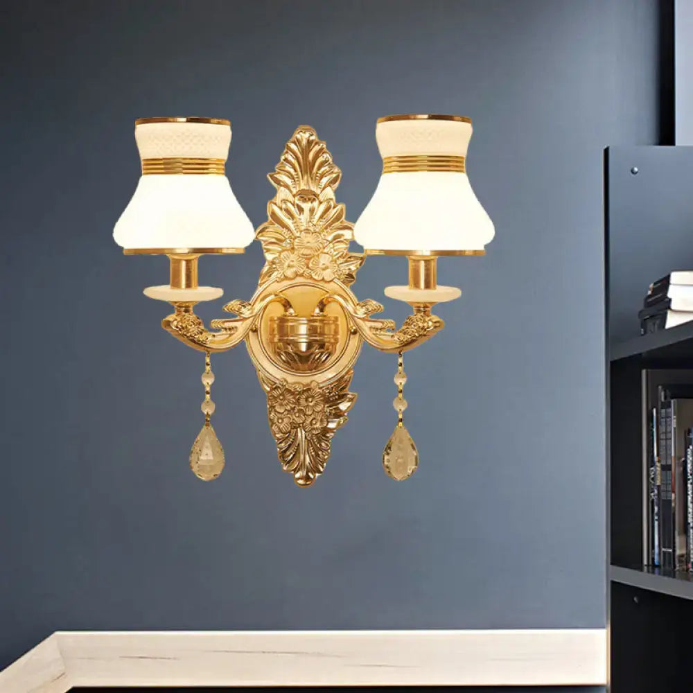 Gold Frosted Wall Sconce with dual candle lamps, ornate backplate, crystal drops by Decorbites on Tampa Home & Garden Store
