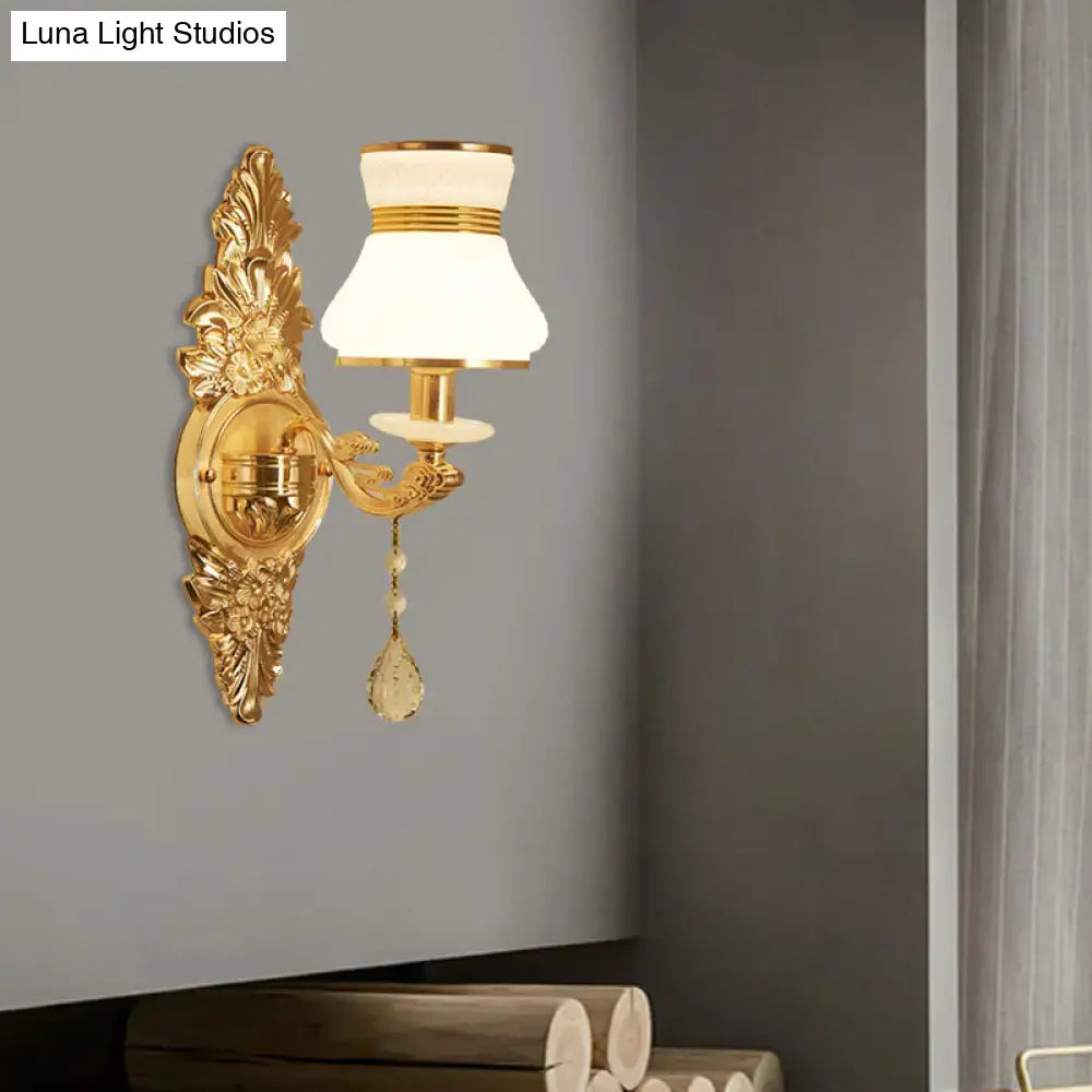 Gold frosted wall sconce with ornate leaf-backplate, white frosted glass shade, Decorbites on Tampa Home & Garden Store