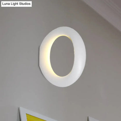 Black LED aluminum circline wall light by Decorbites, circular ring with warm inner glow on Tampa Home & Garden Store