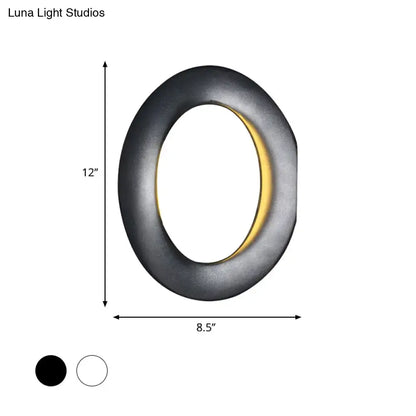 Black LED aluminum circline wall light by Decorbites, 12 in height, 8.5 in width, warm glow on Tampa Home & Garden Store
