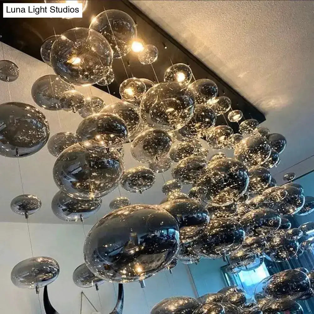 Modern oval bubble ball silver chandelier with glass orbs, dining room light by Decorbites on Tampa Home & Garden Store