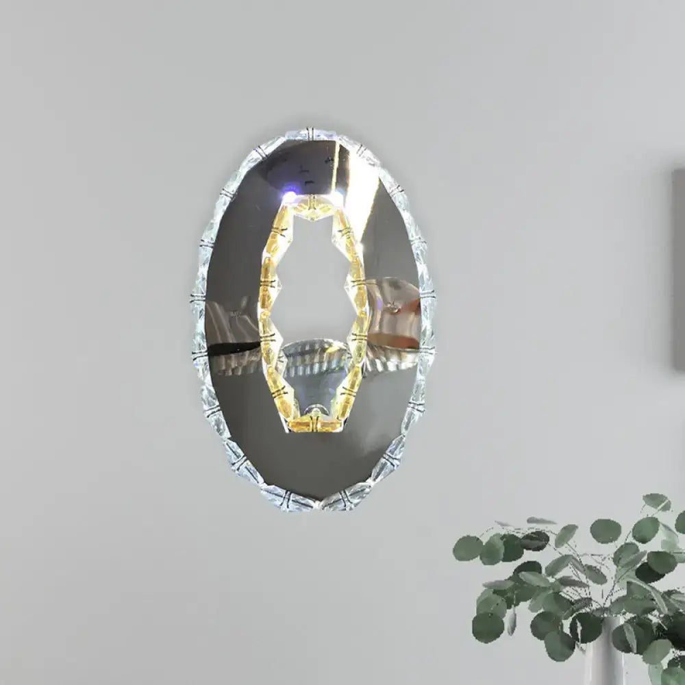 Chrome Crystal Warm White Wall Sconce by Decorbites, oval crystal frame with gold inner glow on Tampa Home & Garden Store