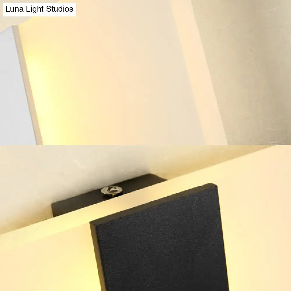 Metal Oval LED Sconce by Decorbites, black metal finish, wall-mounted with warm glow on Tampa Home & Garden Store