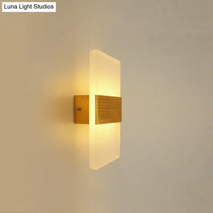 Metal Oval LED Sconce with warm white glow and wooden backplate Decorbites on Tampa Home & Garden Store
