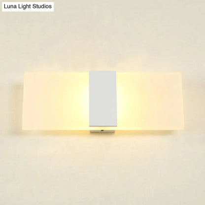 Metal oval LED sconce by Decorbites with white shade and central bar, warm wall light on Tampa Home & Garden Store