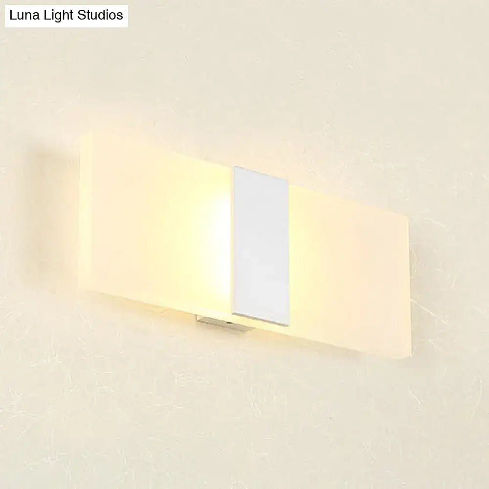 Metal oval LED wall sconce by Decorbites with warm glow on Tampa Home & Garden Store