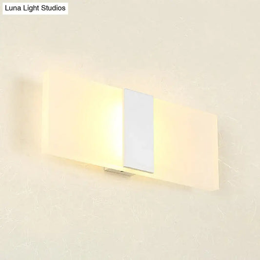 Metal oval LED wall sconce by Decorbites with warm glow on Tampa Home & Garden Store