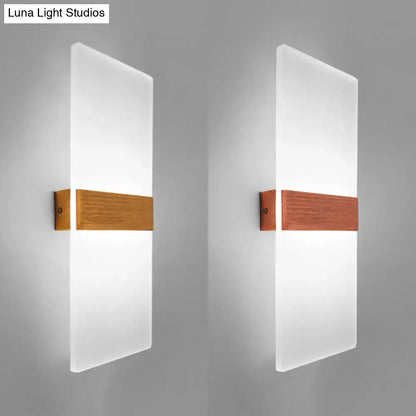 Metal Oval LED Sconce with frosted white glass panel and wood accent, pair shown on Tampa Home & Garden Store