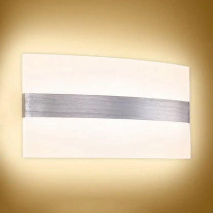 Metal Oval LED Sconce by Decorbites with white panel and brushed silver band on Tampa Home & Garden Store