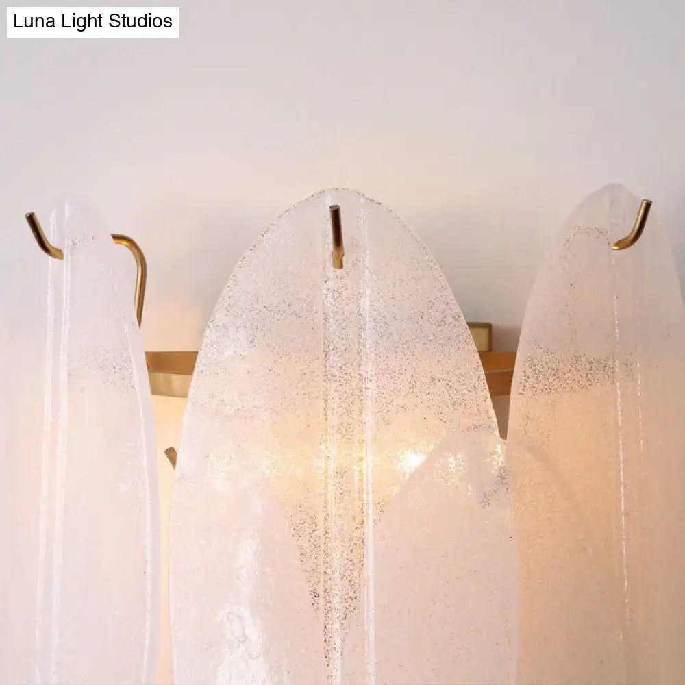 White glass leaf sconce with chrome three-light fixture by Decorbites on Tampa Home & Garden Store