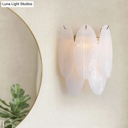 White glass leaf sconce with chrome three-light by Decorbites on Tampa Home & Garden Store