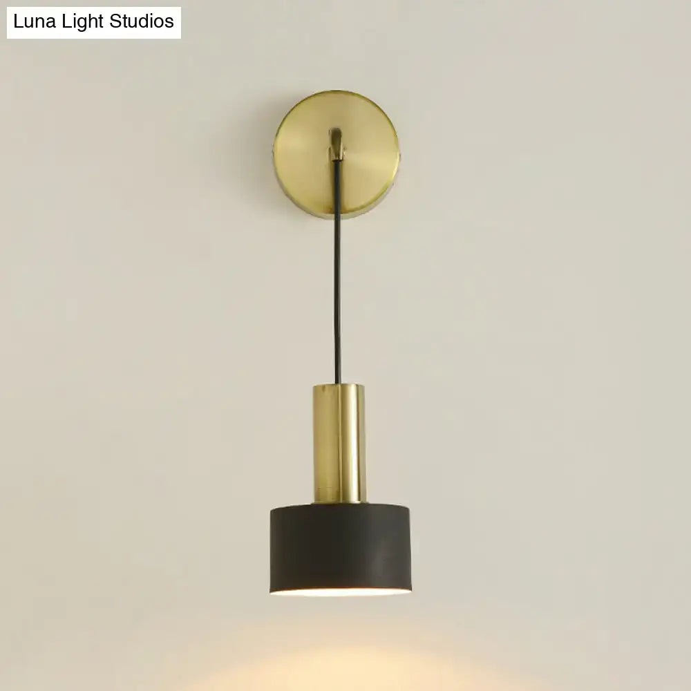 Pink brass wall lamp by Decorbites with black drum shade and gold ceiling mount on Tampa Home & Garden Store