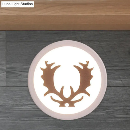 Pink deer wall sconce with copper antlers and soft white glow by Decorbites Home & Garden on Tampa Home & Garden Store