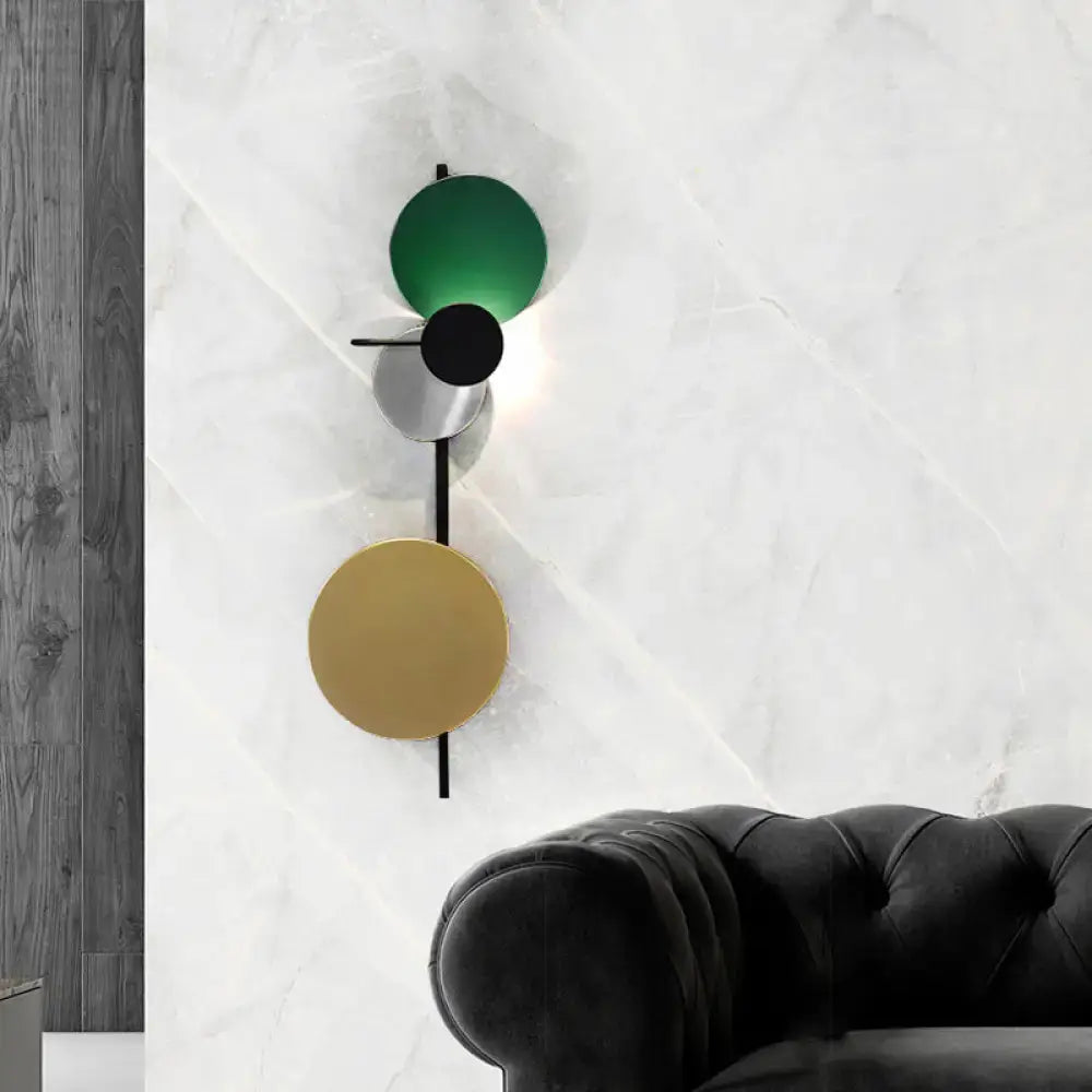 Pink Gold Circular Wall Light by Decorbites with stacked discs on a rod against marble wall on Tampa Home & Garden Store