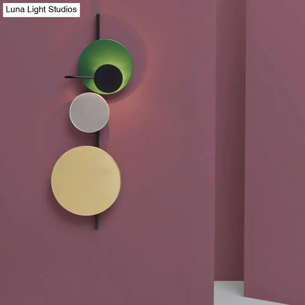 Pink Gold Circular Wall Light by Decorbites with three colored discs on a slim black rail on Tampa Home & Garden Store