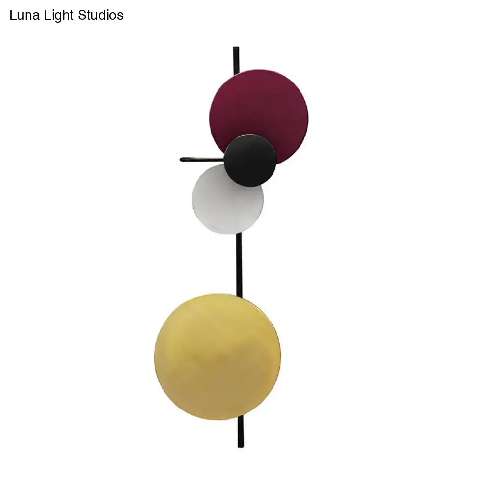 Pink Circular Wall Light with stacked pink, black, white and yellow discs on vertical rod on Tampa Home & Garden Store