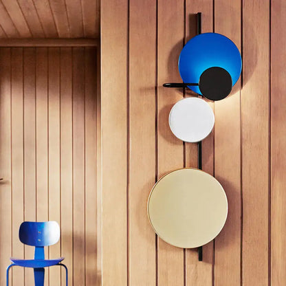 Pink Circular Wall Light by Decorbites, modern wall sconce with multicolor discs on a vertical mount on Tampa Home & Garden Store
