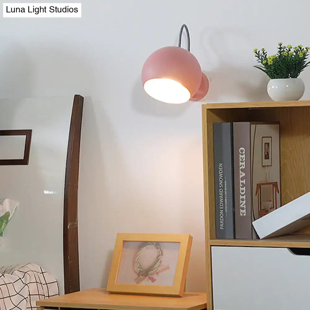 Pink spherical wall lamp by Decorbites, wall-mounted fixture with warm white glow on Tampa Home & Garden Store