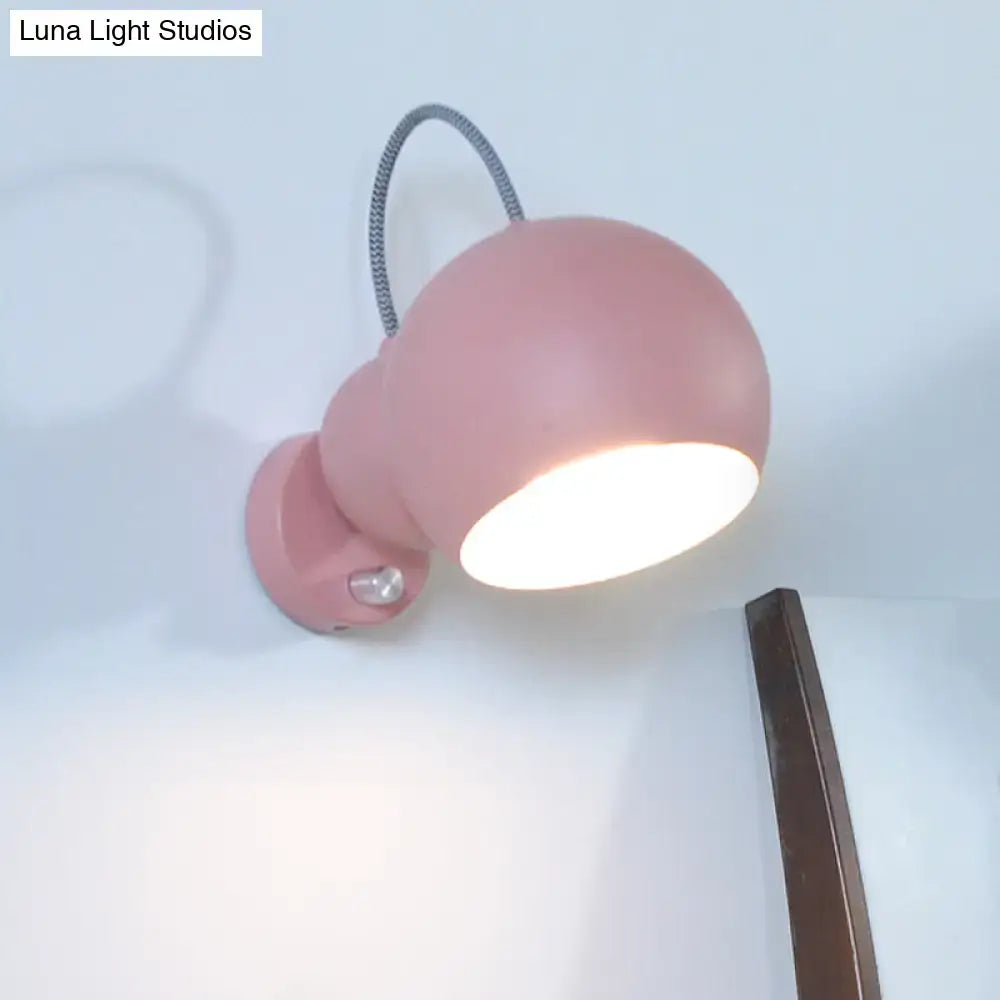 Pink spherical wall lamp with round shade and braided neck Decorbites Luna Light Studios on Tampa Home & Garden Store