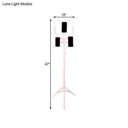 Decorbites pink triple ring light on a tall pink stand with three black phone holders on Tampa Home & Garden Store